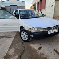 بروتون 2001 مكينة 2000نوزل جديدة و صدر جديد رقم نجف انكليزي باسمي وين ...