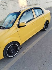 وبركاته .. سيارة افيو موديل (2011) شرط مكينة وكير  .. كاربون بانزين هي...