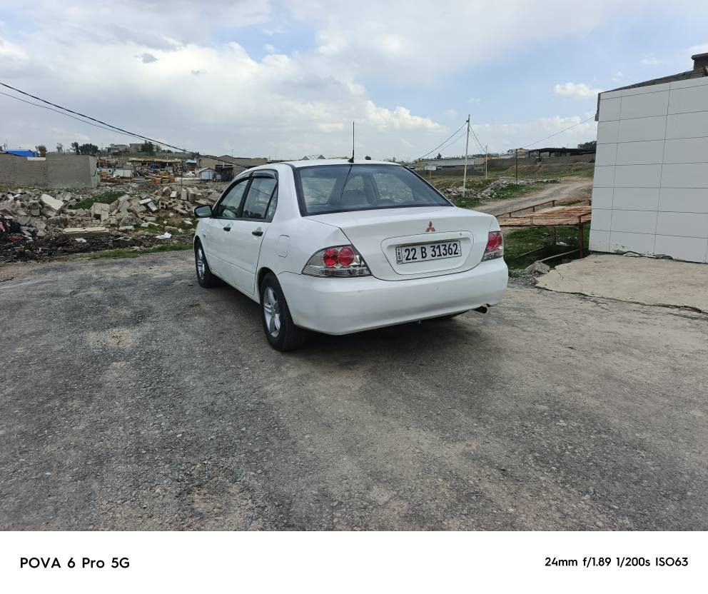 لانسر موديل 2010كير تؤماتيك
مه كينه گوره كيرو كه كينه به شرت
رقموو سنه وي نويه به ناوي خؤمه 
6بارجه سبوغه جه مبيكي پشتي 
هه يه قباغ جاملغه كي كؤرايه 
سحر 62ورقه و مجال*********** أربيل, العراق
