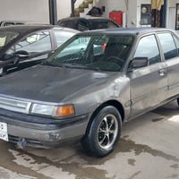 مازدا ٣٢٣ • ١٩٩١ • اوتوماتيك