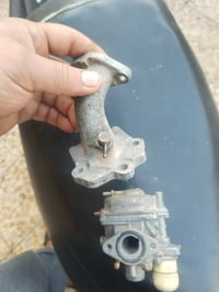 كابريتر اصليه مع قاعدتهة مال دراجه ساسوكي رياضي السعر خاص 07740776572