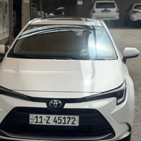 كورلا هايبرد شكل الأمريكي موديل 24 فول مواصفات داخل جلد قرميدي ماشيه 3...