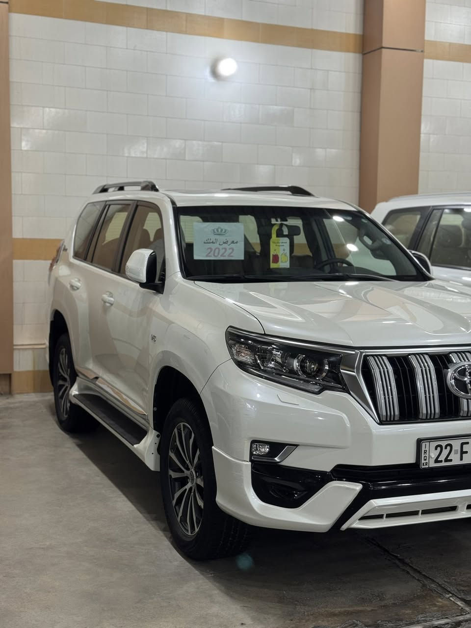 🧿معرض الملك لتجاره السيارات 🧿 
العنوان_ معارض النهضه _ الفرع الثالث _ فرع المصرف 

        تيوتا  برادو 2022 سبعينيه سبير تعليك 

#المواصفات

 🔹النوع :  تيوتا برادو 

🔹الفئة: TX.S

 🔹الموديل : 2022 لون ابيض  

🔹بصمة تشغيل عند بعد

🔹داخل قرميدي 

🔹بكليت لد 

🔹تحكم ستيرن

🔹ويل كب حجم 19 

🔹شاحن واير ليس

🔹شاش + كامره 

🔹حساس خلفي 

🔹كشنات جلد 

🔹كشنات عدد 2 كهرباء 

🔹مري شفط 

🔹فتحه سقف 

🔹كروس سرعه 

🔹بصمه + تشغيل عن بعد 

🔹ثلاث قطع تبريد 

🔹فتحت USB

🔹شاحن واير ليس 

🔹ثلاجه.  

🔹نضام الدفع الرباعي 

العنوان / بغداد / النهضة / الفرع الثالث فرع المصرف

========================
للاستفسار اكثر عن تفاصيل السيارة يرجى مراسلة صفحتنا على فيس بوك او الاتصال بالمعرض  مباشرة عن طريق الرقم الخاص في المعرض : 
📲***********
***********
