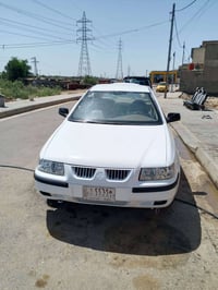 سمند ٢٠١٠ • أبيض • مكينة وكير مكفولة