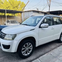 ساسوكي كراند فيتارا 2014 صبغ بين البابين وصندوق السياره جديده وكامله ر...