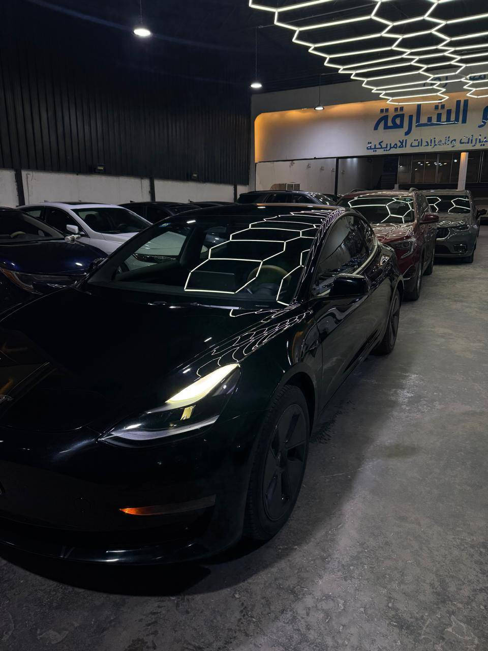 السلام عليكم اول شي نذكر رسول الله وأل بيته.
السياره تسلا وارد امريكي .
الوان: اسود
محرك السياره : كهربائي
السياره رقمه بغداد 
عداد المسافه 8000ميل
موديل السياره 2023.
حادثه : ثلاث قطع خلفيه فقط.
مواصفاتها تحكمت استيرن قياده ذاتيه عداد تحديد السرعه  كامره ليليه شاشه كبيره وفتحت سقف بني رامه وبيه كارتين وتنربط على التلفون السياره اونلاين وشاحنه وياه 32 امبير .
 صاحب المعرض1 علي الكرعاوي.                                         صاحب المعرض2 مصطفى شعبان.                                      رقم المعرض:***********. سعر السياره 165
