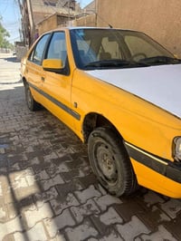 بيجو 405 للبيع كير ومكينه مكفولات وكشركه مكفول من صبغ وظربه السعر 35 و...