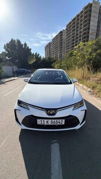 كورلة هايبرد موديل ٢٠٢٥ ماشية ١٥٠٠٠الف كفالة عامة ما  عدة شخوط بسيطة ا...