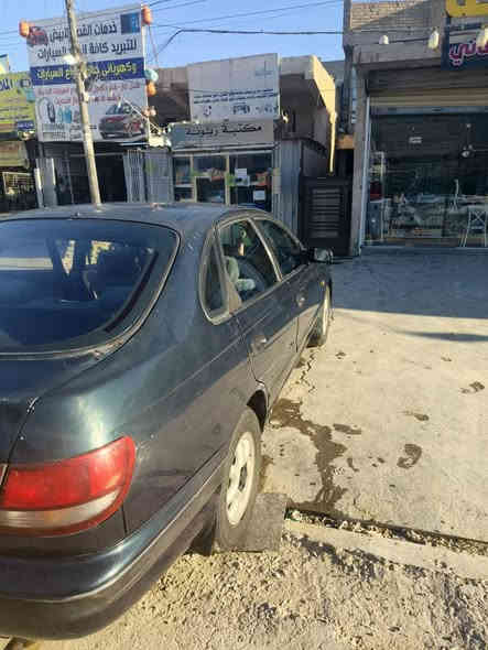 السلام عليكم تيوتا كارينا موديل 1992 سياره يسره بلادي مكينه 1800 كير عادي تبريد ثلج سياره بلاديه جاهزه من كل نواحي سياره فول سلايد و جامات كهربائي سنترلك رقم دولي جديد بسمي تحويل ثاني يوم سعر 53 بي مجال مكان سياره بغداد العامرية رقم تلفون *********** بغداد
