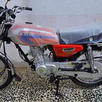 دراجة نارية • سكنر • حي الصادق