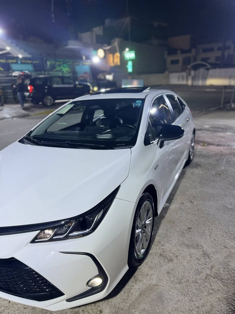 🔹 الموديل: 2024  � للبيع — تويوتا كورلا 2024 هايبرد (صيني) 🤍

🔹 النوع: هايبرد (بنزين هايبرد )  
🔹 اللون: أبيض لؤلؤي  
🔹 الوارد: صيني (كورلا / ليفين)  
🔹 الممشى: (14000)
🔹 القير: أوتوماتيكE-CVT  
🔹 المحرك: 1.8 لتر هايبرد اقتصادي جداً  
🔹 صرفية الوقود: تقريباً 4 لتر / 100كم (China Auto Direct)  

✨ المواصفات:  
✔ شاشة + كاميرا خلفية  
✔ حساسات أمامي وخلفي  
✔ تشغيل بصمة  
✔ نظام تثبيت سرعة  
✔ نظام مانع انزلاق  
✔ ايربكات  
✔ تحكم دركسون  
✔ تبريد وتدفئة  

📌 السيارة نظيفة جداً / (حدد: بدون حادث مكفوله كفاله عامه )  
📌 جاهزة للاستخدام اليومي واقتصادية جداً  

💰 السعر(: 149$) قابل للتفاوض  
📍 الموقع: (بغداد )  

📞 للتواصل: (***********)
