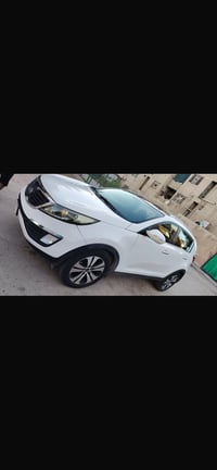 للبيع كيا سبورتج 2014 خليجي رقم بغداد فول مواصفات 1- بانورما  2- كشنات...