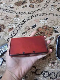 نينتندو 3DS • بحالة لوك • احمر غريب
