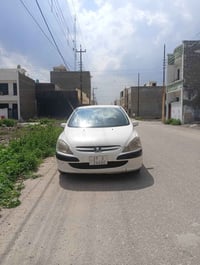 بيجو فرنسي307.   2005سياره خير من الله نواقصه بصيطه تبريد شغال فول الت...