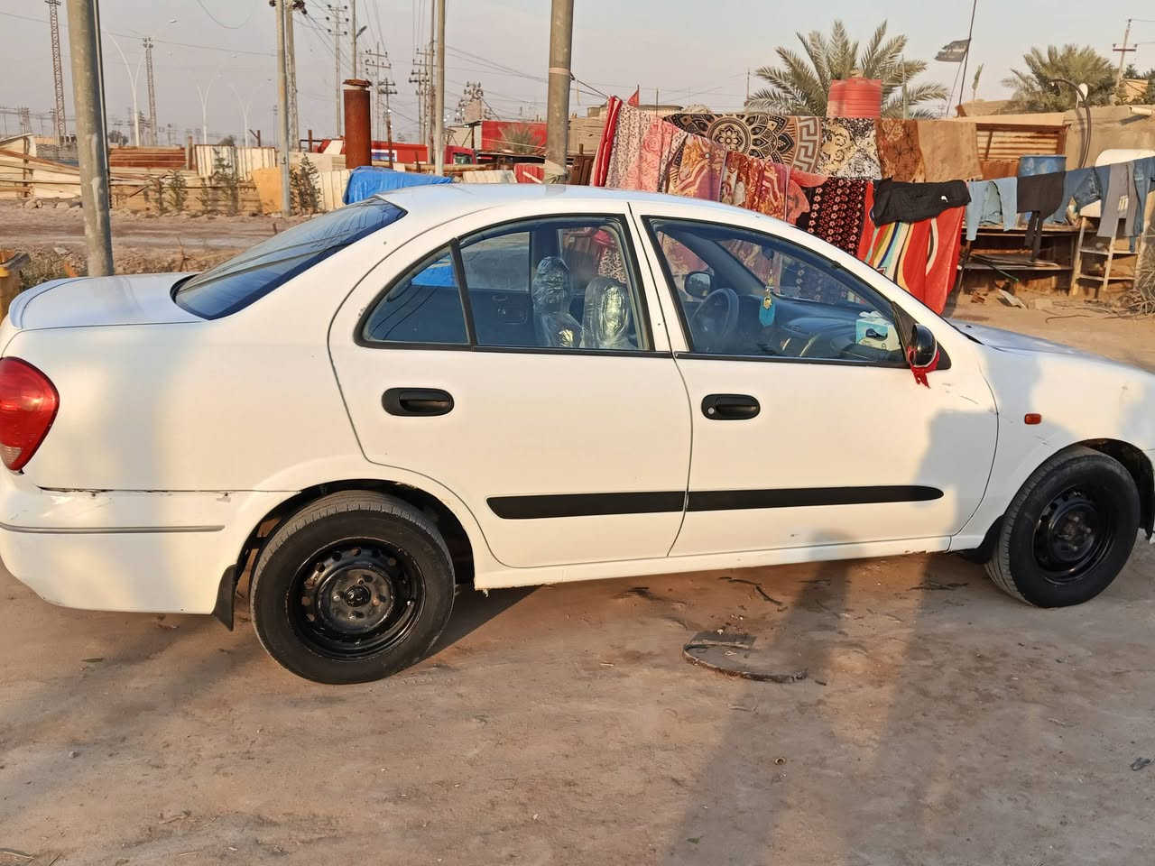 السلام عليكم نيسان سني ياباني موديل 2005
 محرك قبق اسود مكينه بيها تنقيص بدون بخار فقط تنقيص گير اوتماتيك رقم قادسيه مشروع وطني حداديه 80% البدي شوفت عينك بي طخات بسيطه السيارة احلى من الصور السعر 75 وبيها مجال قليل للاستفسار ***********
