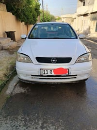 استرا 2001 كير اوتو رقم مسطره أنا شرعيها موصل الأيمن سعر 48 وبيها مجال...