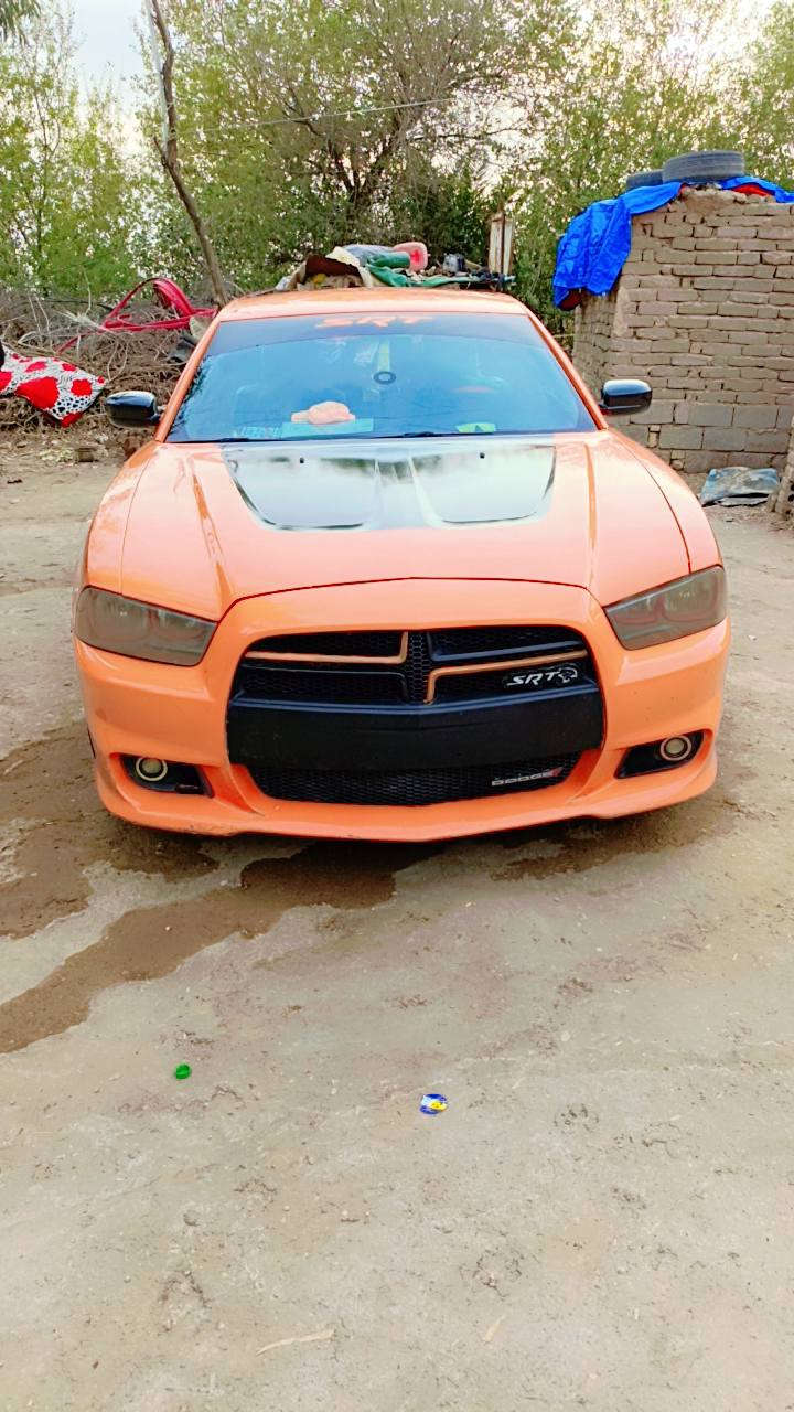 جارجر موديل 14 الون🍊 برتقالي بلادي خصوصي  بسمي رقم بغداد سياره فول من عده الفتحه سياره مال جناي حداديه مكينه وكير مكفولات سياره بيه اربع قطع  سياره RT مكينه هيمي 5,700 سياره رياضيه  وعليه هواي إضافات ال  ستفسار *********** مكان الديوانيه
