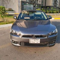 لانسر قرش ٢٠١٦ خليجي السيارة مكفولة وجاهزة من كلشي محرك ١٦٠٠  ومكفولة ...
