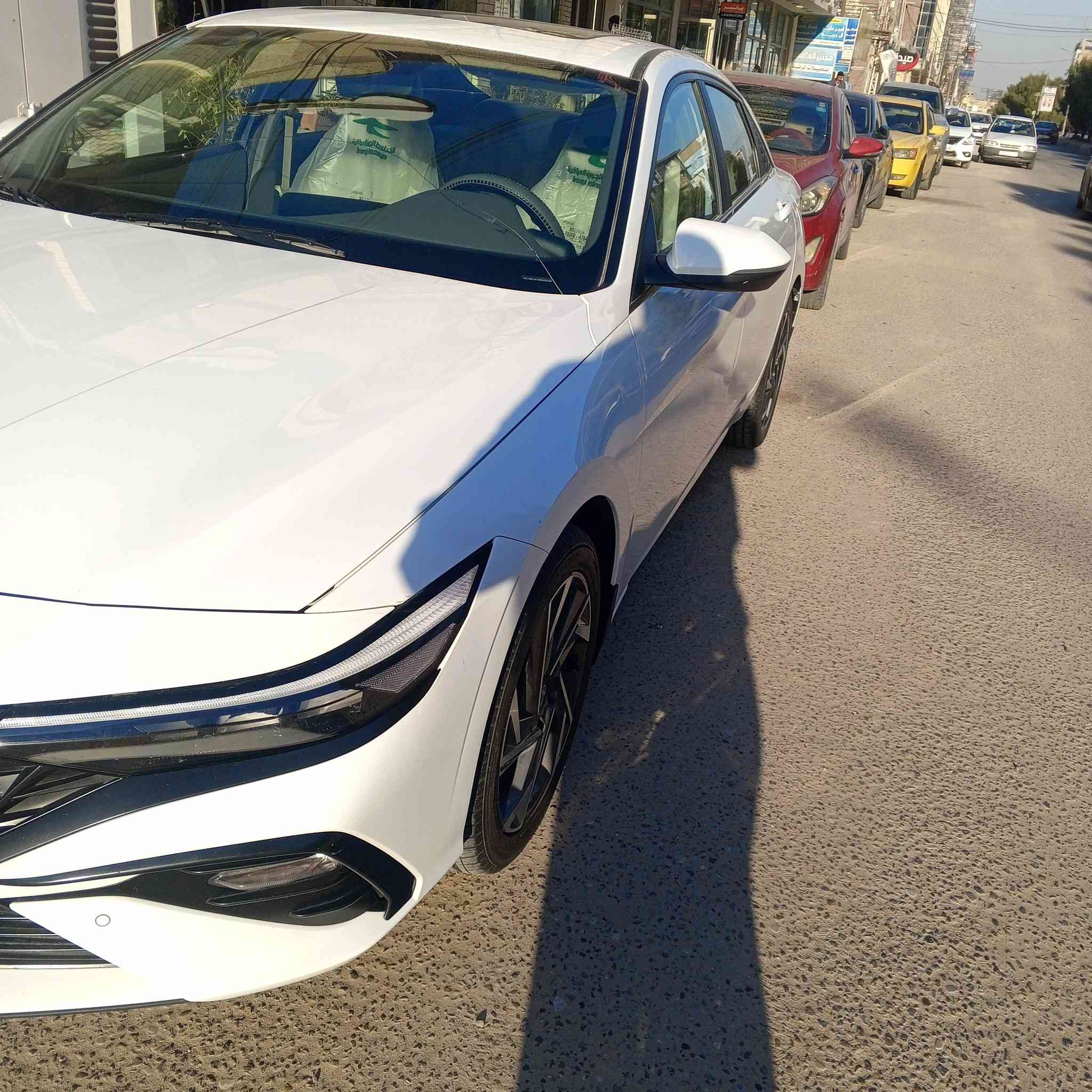 🚗 المواصفات العامة
 هيونداي النترا 2024خليجي اصل رقم بغداد محرك 2000 
الدفع: أمامي (FWD)
⚙️ المحرك وناقل الحركة
المحرك: 4 سلندر
ناقل الحركة: أوتوماتيك CVT (IVT)
نظام الوقود: بنزين
نظام ABS مانع انغلاق الفرامل
نظام EBD توزيع قوة الفرامل
نظام الثبات الإلكتروني ESC
نظام مانع الانزلاق TCS
مساعد صعود المرتفعات HAC
حساسات خلفية
كاميرا خلفية
🎛️ التجهيزات الداخلية
شاشة لمس 8 
دعم Apple CarPlay & Android Auto
مكيف هواء قوي مناسب للأجواء الحارة 🌞
تحكم من المقود
بلوتوث + USB
عدادات رقمية (بعض الفئات)
مقاعد قماش 
✨ المواصفات الخارجية
إضاءة LED أمامية وخلفية
مرايا جانبية كهربائية
إشارات في المرايا
تصميم رياضي جديد
📏 الأبعاد 

188وبيه مجال
***********
