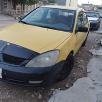 لانسر • ٢٠١٠ • كالار