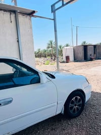 اكسنت • ٢٠٠٤ • رقم بابل