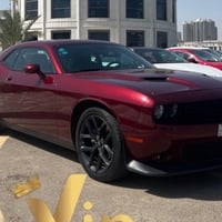Sxt 2023 جالنجر Black top Last call لون كرزي ماشية 21 الف مكان السيارة...