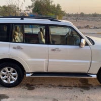 باجيرو 2010رقم بغداد لون ابيض صدفي باسمي حبتور موصفات معروفه فول السيا...