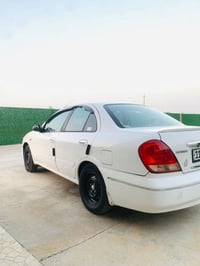نيسان سني ٢٠٠٨ بغداد مكفوله من الضربه بيه فقط دعامات  هزه جديده رقم ان...