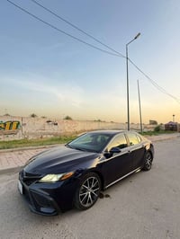 كامري 2021 SE للبيع وارد امريكي حادث بنيد وجاملغ   بانزين رقم بغداد تح...