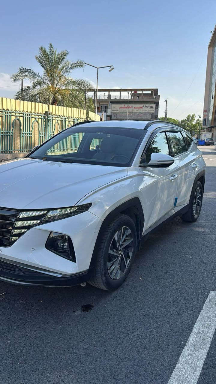 السعر 21 بيها مجال  ⬇️
توسان ٢٠٢٤ خليجي رقم بغداد
 ماشيه فقط 32 الف 
السياره فول عدا البانوراما 
بصمه 
تشغيل عن بعد
كشنات كهرباء
حساس امامي
حساس خلفي
نظام قياده ذاتيه 
لايت زنون
بك لايت
سايد بريك بصمه
اوتو هولد 
مانع الانزلاق 
مانع انحدار
كامره دواره
داخل ابيض
شاشة كبيره 
نظام كار بلي 
وبيها بعد هواية مواصفات 
 بيها بارد فقط مثل ماموضح بالسونار 
العنوان اليرموك للاستفسار *********** بغداد, العراق
