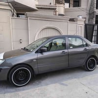 لانسر للبيع ٢٠١٠ مصبوغه عام اثر جراد فقط جاملغ يسره الخلفي للاستفسار 0...