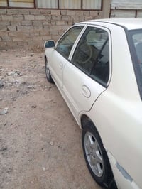 بروتون للبيع موديل 2004مكفولة سعر 57 بيها مجال بغداد07765582302