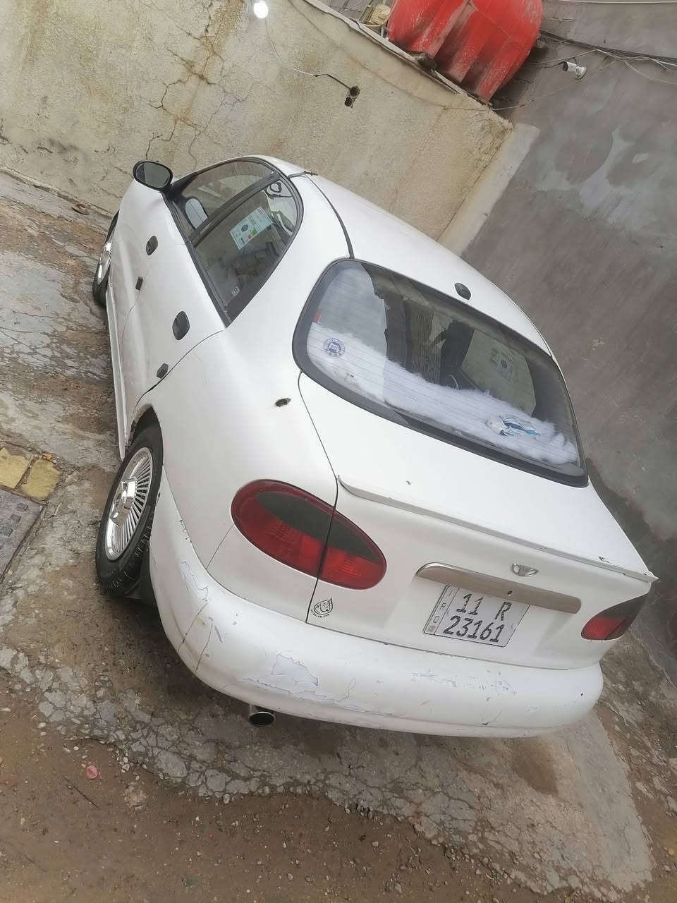 السلام عليكم للبيع دايو لانوس موديل 1998 رقم بغداد مكينه وكير جدد صدر امامي خلفي جديد مكفولة من الضربه والتبديل  تبريد شغال سنويه 2028باسمي مكان بغداد السعر 31 وبيها مجال بسيط رقم الهاتف ***********
