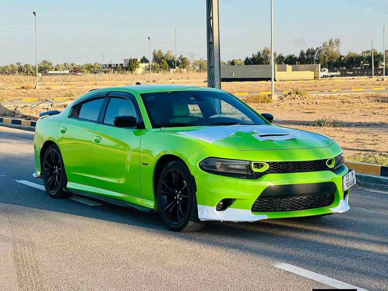 جارجر   GT   2019 ( امريكي )السعر 169 
لون  ((تفاحي)) معروف المميز 
بيه اربع قطع صبغ بدون دواخل 
  فول  مواصفات عده الفتحه 
سياره جديده اي نقص ما بيهه ابد 
(سيارة  ماشية70 ميل )
 سياره جديده بمعنى الكلمه
رقم بغداد باسمي الجديد كلشي جديد هزه و رقم جديد 11
المحرك : V6.  3.6L .
المواصفات :
* ويل قياس 20 انچ  بلادي تخم تاير جديد
* ستيرن رياضي . 
مقاعد رياضية جلد 
* مصابيح أمامية زنون . 
* كشافات الضباب زنون . 
* المصابيح الأمامية مع LED . 
* حساسات . 
* شاشه كبيرة مع نظام ملاحة نفكيشن GPS .
* الشاشة مع اوپشنات SRT . 
* سستم صوت الپاين .
* مقاعد أمامية كهربائية عدد 1 
* مقاعد أمامية وتدفئة . 
* تشغيل عن بعد . 
* تدفئة ستيرن . 
* محدد سرعة . 
* تلفون بلوتوث . 
* كاميرا خلفية .
* مرايا متحسسة للاضاءة العالية .
* دخول ذكي (بصمة) .
سياره جديده بمعنى الكلمه 
للتواصل ‭***********

