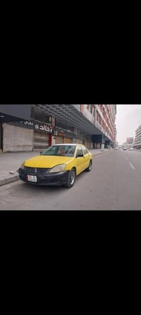 ميتسوبيشي لانسر • لانسر • سيارة للبيع • سيارات قادسيه • سيارة اوتوماتي...