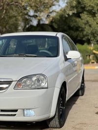 شوفرليت اوبترا موديل 2010 رقم بغداد مشروع وطني الجديد   شرط تحويل  مكي...