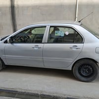 لانسر ٢٠١٠ • محرك مفتوح • حادث وصبغ
