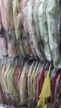 الكندي • ملابس نسائية وأطفال • نجف حي الميلاد