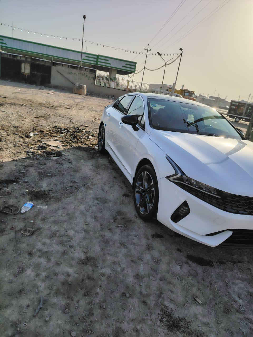 #للبيع_فقط كيا k5 موديل 2023 ماشيه 70الف حقيقي شرط الفحص  السياره مكفوله كفاله عامه من الشخط او الرصعه فول مواصفات للخير  مكينه 2000 مكان السياره بغداد اقواس بغداد السعر 225 مع المجال للستفس‏‪***********‬‏
