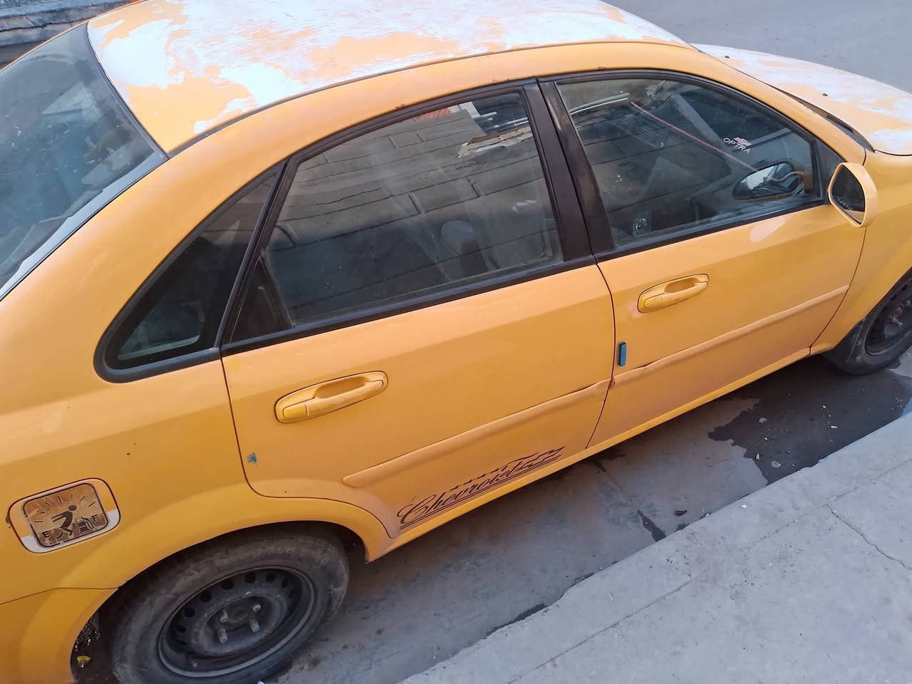 سلام وعليكم اوبترا موديل 2010عنوان بغداد حي الجامعه الرقم *********** بيه جاملغ  المامي عكس السائق مبدل ول باب وره السائق مبدل السعر 62 وبيه مجال الطيبين وبيه ضربه بل جاملق الخلفي مثل مامضح بل صوره
