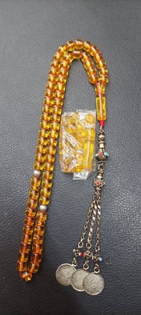 سندلوس • ٦٥ حبة • فواصل فضة