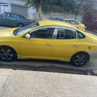 افانتي 2010 • مكينة شرط • كشنات جلد