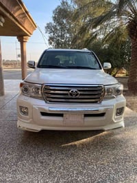 لاندكروز 2014 بريم السياره كفاله عامه السعر 370  07712588979