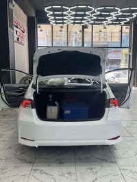 كورلا 2025 هايبرد  شكل الخليجي 💯  مرقم بغداد وجاهز مثبت لوحات وسنويه ب...