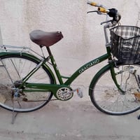 بايسكل بناتي حجم 27 لون زيتوني  نضافة 90% كير شيمانو ضرر الجاملغ الخلف...