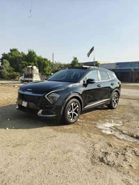 سبورتج للبيع LX مويل 2025 فتحه شحن لاسلكي رادار امامي خلفي كشنات جلد ك...