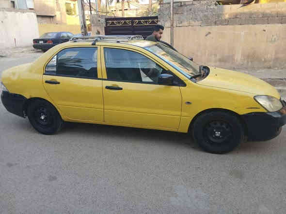 السلام عليكم لانسر للبيع المديل 2010 السياره جاهزه مكينه وكير خير من الله سياره بيه طخه بل جاملغ فقط السعر 80 وبيه مجال ***********
