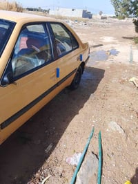 من رخصة الادمن المحترم سلام عليكم   بيجو 405 رقم احمر بغداد  سنويه عظم...