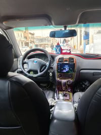 كيه اوبتيما موديل ٢٠٠١ امحدث٢٠٠٥ سنويه ٣٤ رقم بغداد انكليزي سياره بسمي...