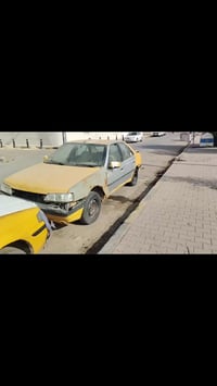 بيجوه 405 • ٢٠١٣ • كوت رقمي